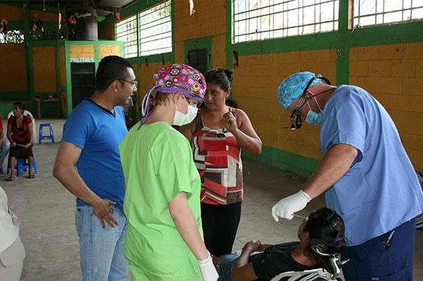 A patient is being checked out by Dr. Dyer on his mission trip.